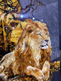 Panels of amber and Karelian birch "Lion"